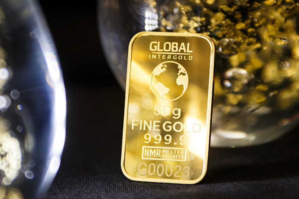 Altın fiyatları yeniden 5 bin  doların &uuml;zerine y&uuml;kseldi